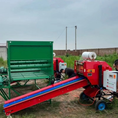 上料機(jī)配青儲(chǔ)飼料打捆包膜一體機(jī) 圓草捆青貯飼料打捆機(jī)售后三年